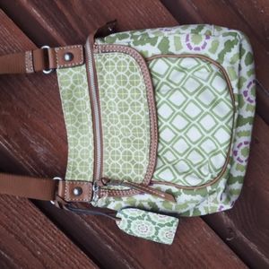 Fossil  Floral canvas green, cream and purple cross body bag.